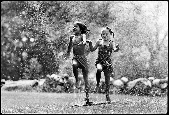 Girls loving the Sprinkler