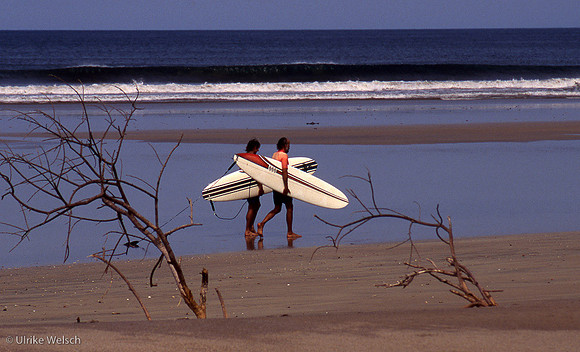 Surfers along Playa Tamarindo, Costa Rica: CRPGRec1_9