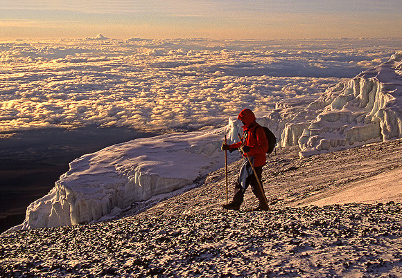 Hiker on Kilimanjaro at sunrise: TzLKili3_1